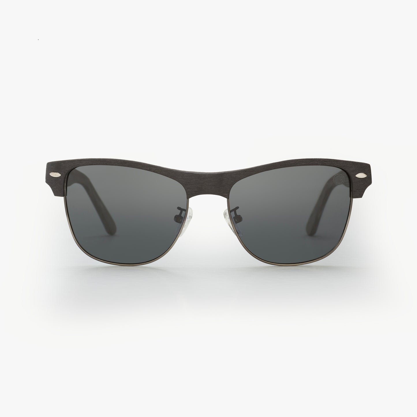 Sunglasses with dark lenses and black frame on a white background