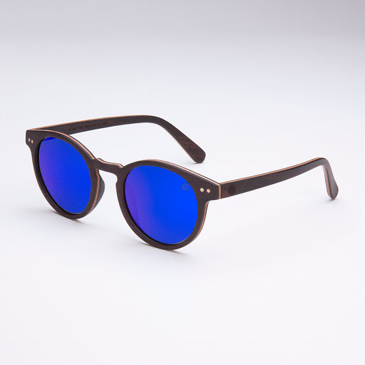 A pair of sunglasses with a black ebony wood frame and blue polarized lenses.