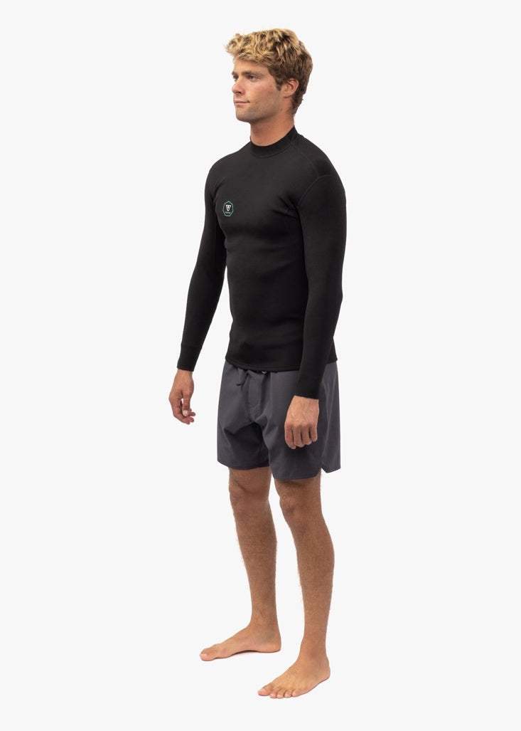 Vissla 7 Seas black long sleeve neoprene wetsuit jacket with a small chest logo and slim fit design