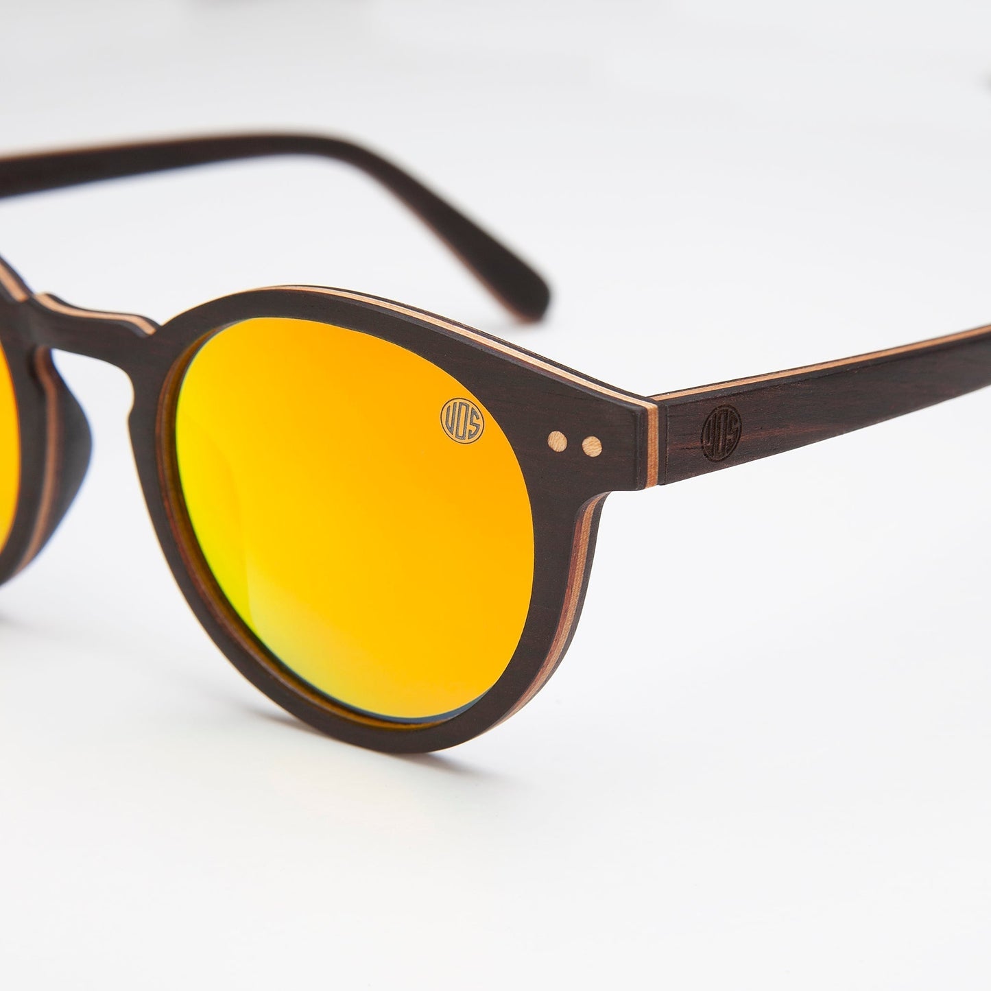 circular sunglasses product photo showing polarised lens and wooden arms