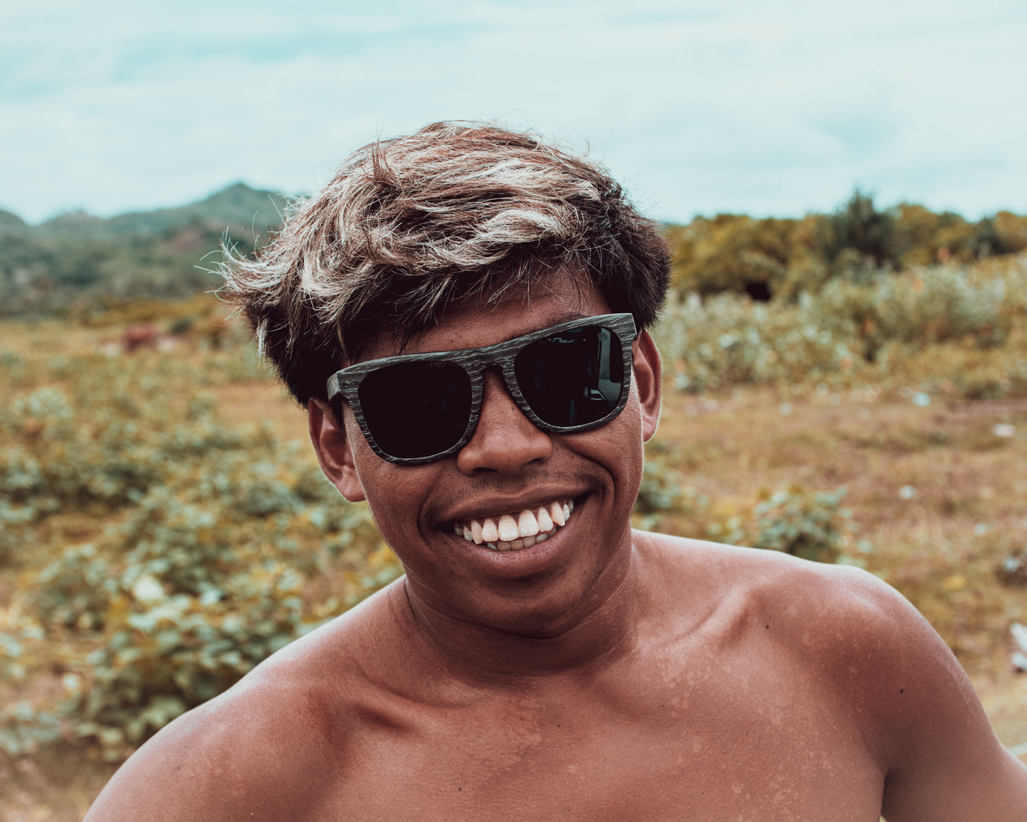 Black Wood Sunglasses, featuring polarised lenses. Featuring a unique unisex design. design