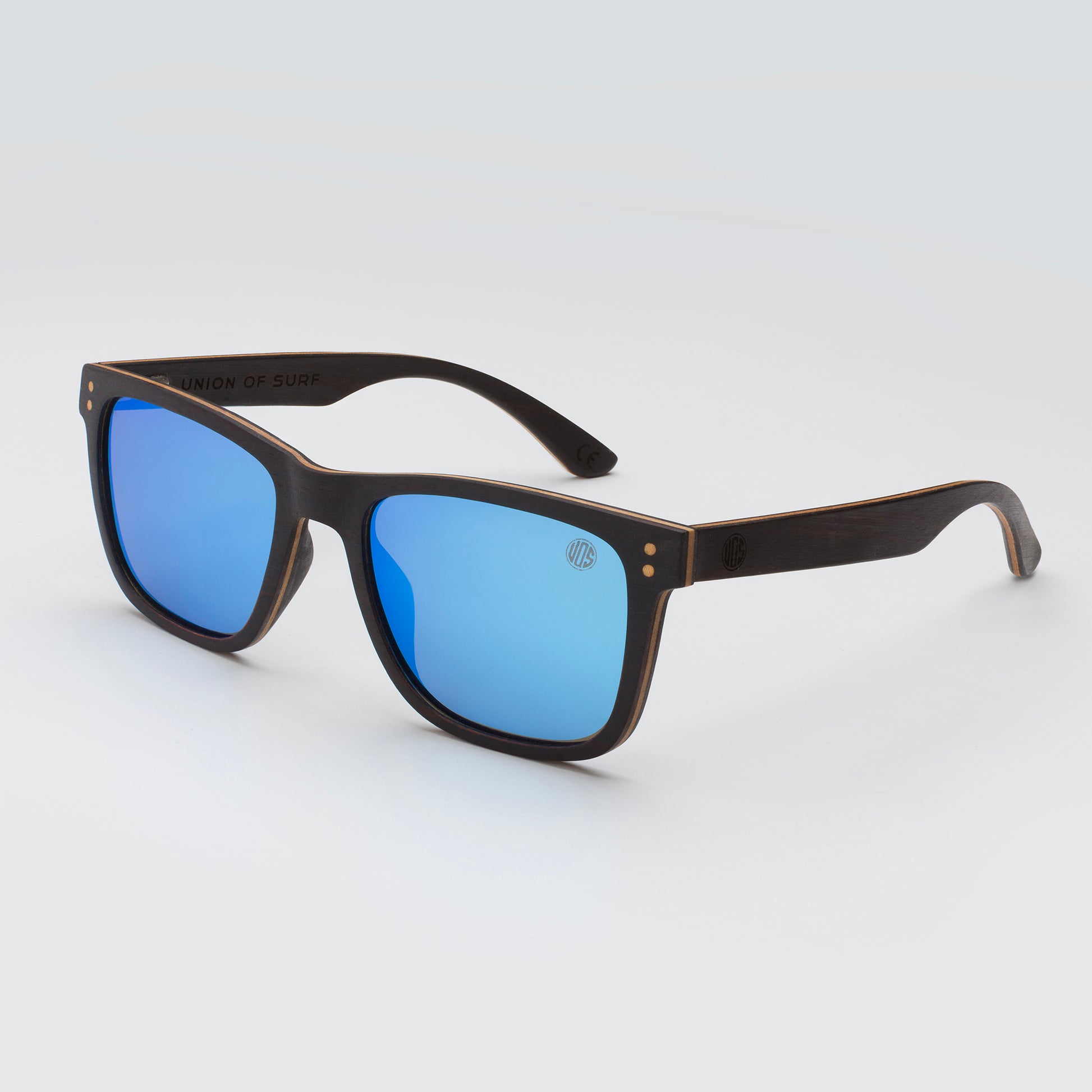 close up of black wood sunglasses with blue mirror lens