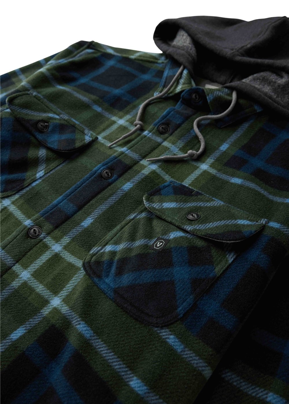 Vissla Eco-Zy Shirt Jacket in green and navy plaid fleece, with a black hood, button front and flap chest pockets.
