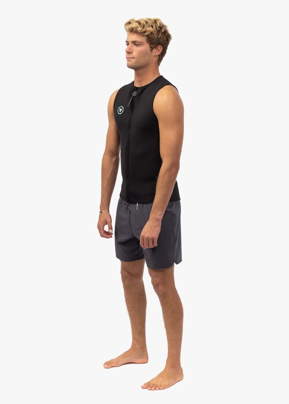 Vissla 7 Seas black 2mm neoprene front zip wetsuit vest with sleeveless design and subtle logo on chest