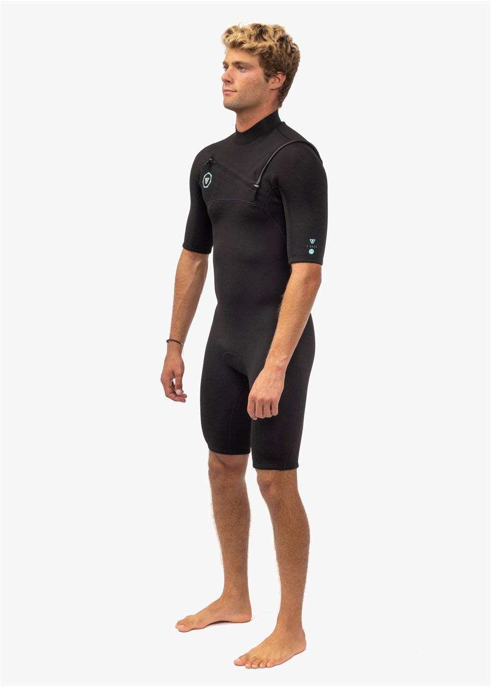 Vissla 7 Seas short-sleeve spring wetsuit in black neoprene with chest zip and minimal seam design for warmth and flexibility.