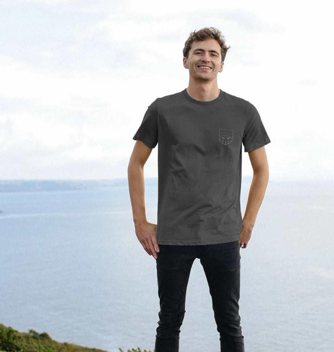 Model wearing Relaxed Fit Organic T-Shirt for Men on a coastal path