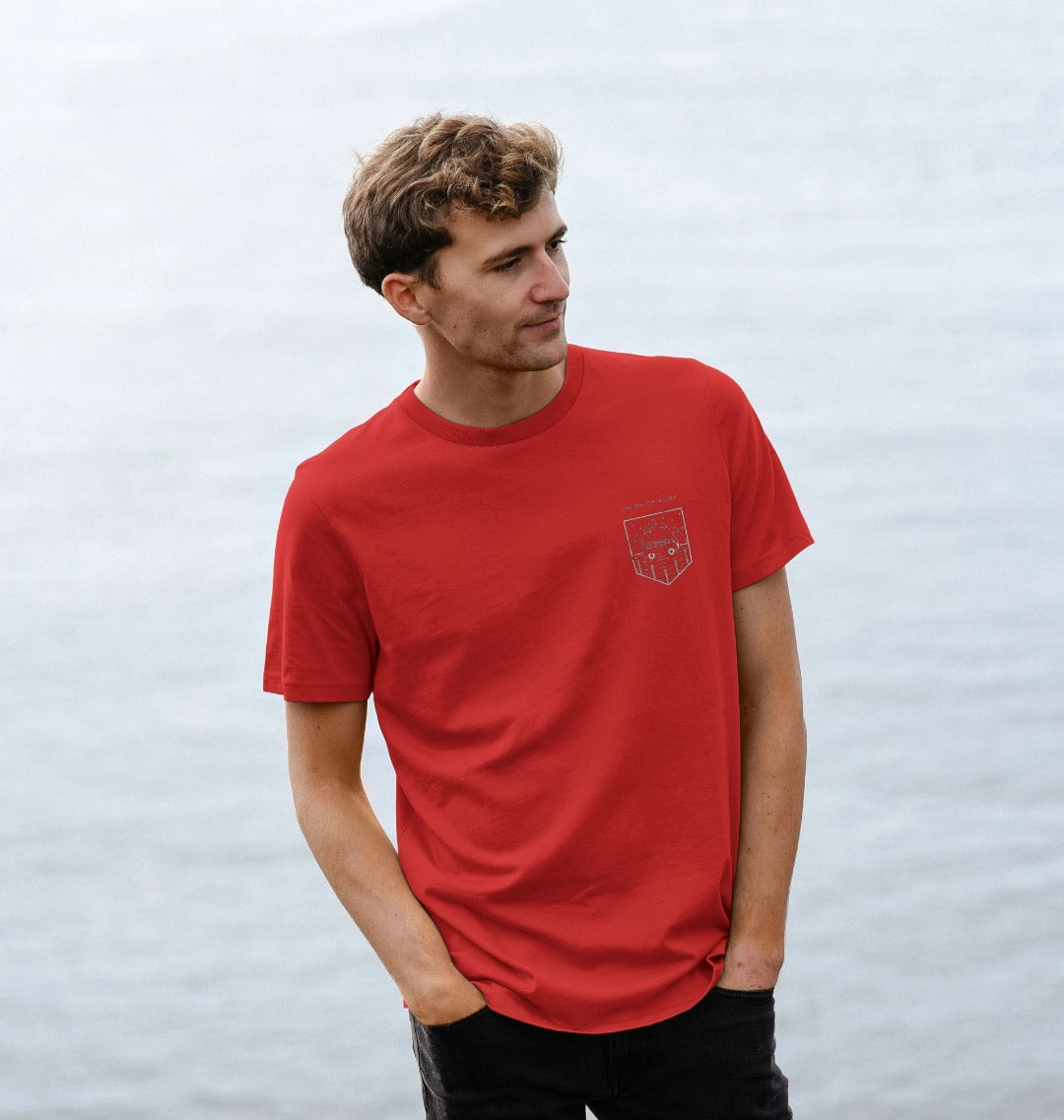 Model wearing Relaxed Fit Organic T-Shirt for Men on a coastal path