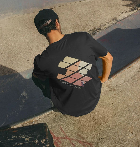 Model wearing Relaxed Fit Organic T-Shirt at the skate park
