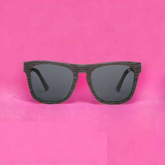 Various sunglasses styles suited for different face shapes including round, thin, long, and triangular faces