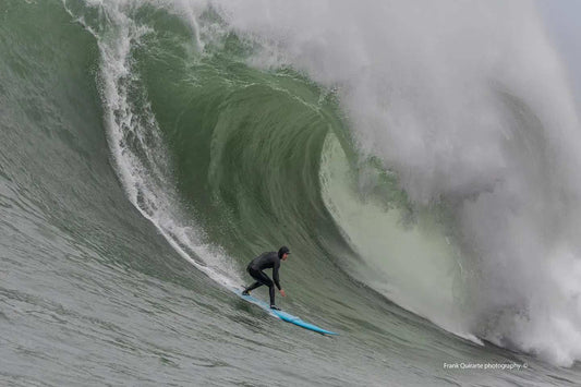 Massive waves crashing at Mavericks big wave surf spot in Northern California during Mavericks season
