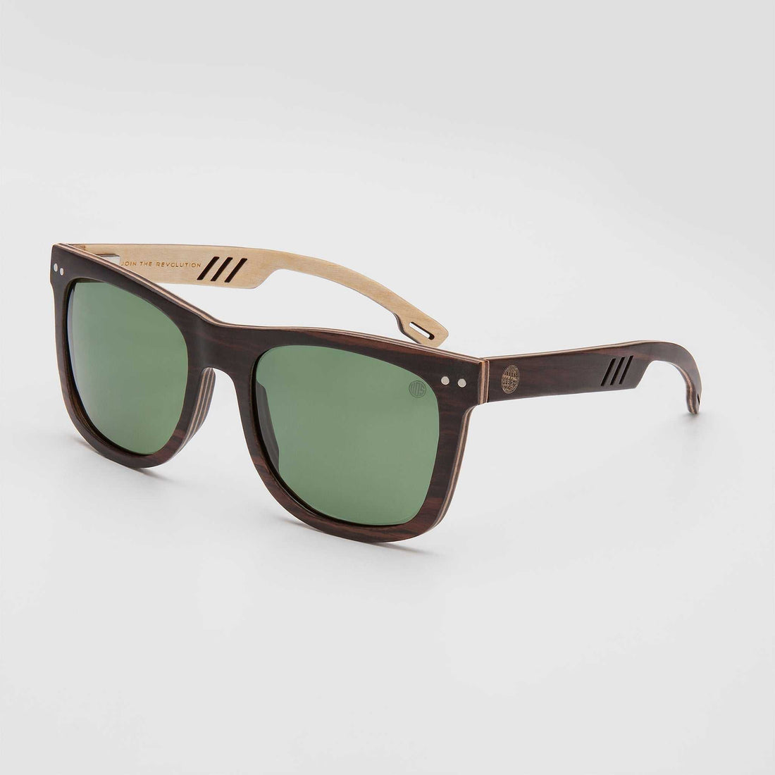 Close-up of G15 sunglasses lens with green tint highlighting clarity, UV protection, and reduced glare features.