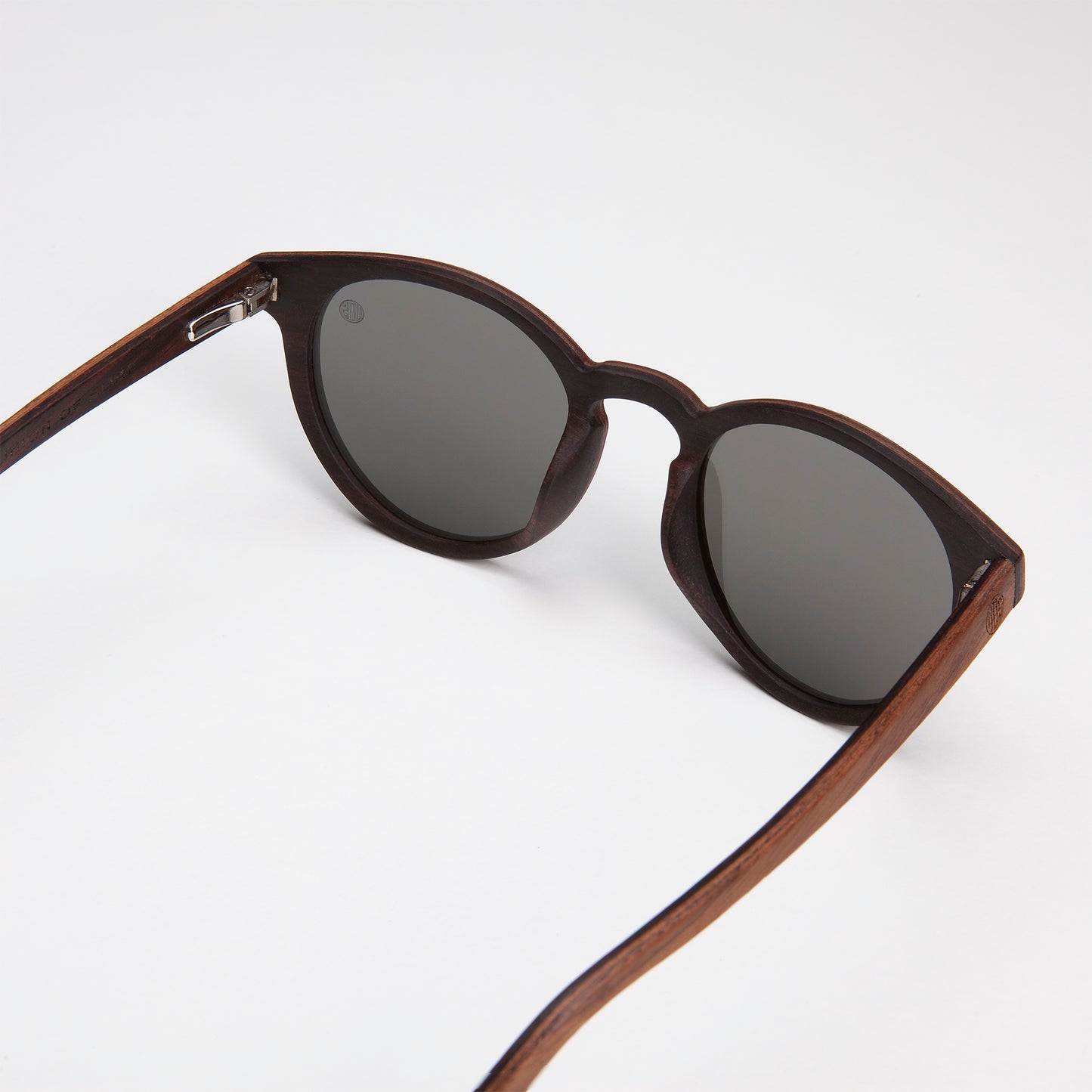 Eco Friendly SunglassesPearl Silver MirrorCatch the summer rays in style with Pearl sunglasses! Featuring polarized mirrored lenses and stylish walnut wood veneer, they are perfect for long days at the beach