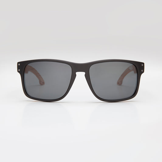 Eco Friendly SunglassesBells Black LensBells are a classic polarised lens designed with a matt black frame and beach wood arms. Available in 4 different colour lens options, you can enjoy protection, glar