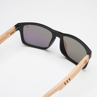 Eco Friendly Sunglasseseco friendly sunglassesBells are a classic polarised lens designed with a matt black frame and beach wood arms. Available in 4 different colour lens options, you can enjoy protection, glareco friendly sunglasses