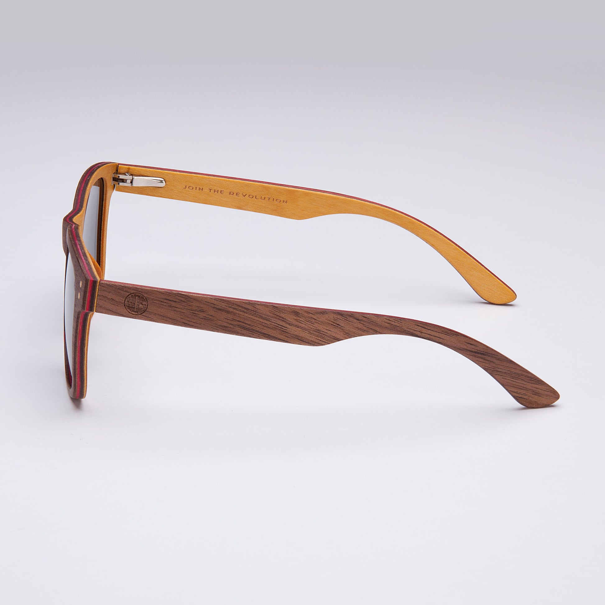 Wooden Sunglasses are Eco Friendly. Silver Mirror LensThe Fistral- Silver Mirror Lens offers a unique twist to any look. The silver mirror finish to these sunglasses helps you stand out. This accessory is perfect for an