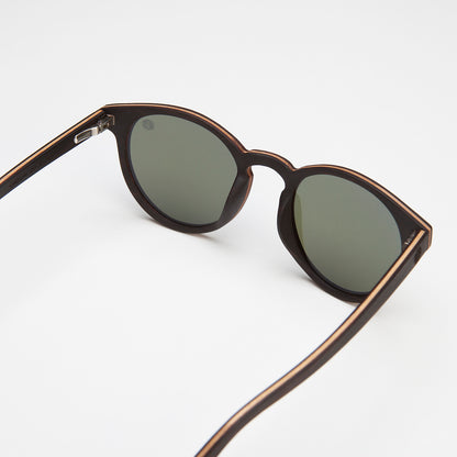 SunglassesBlack PearlStep into the light with these swanky Black Pearl sunglasses! The bold black ebony wood veneer frame is stylishly set off with a polarised lens, allowing you to obse