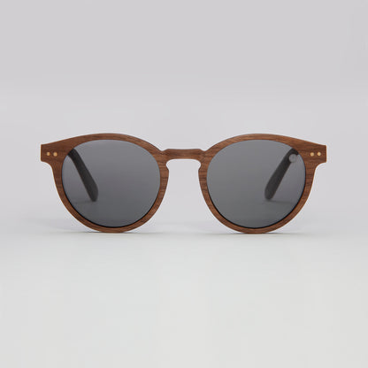 Eco Friendly Sunglasses Wooden Sunglasses for men and womens. Front view featuring a high quality TAC polarised Lens and a frame made form walnut wood veneer