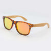 Transparent frame sunglasses with grey polarized lenses at Kuta Beach color party
