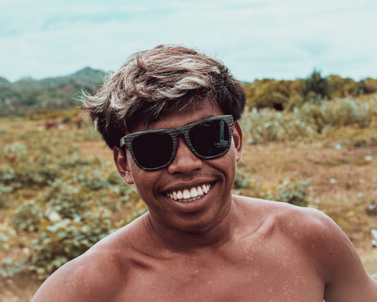 Black Wood Sunglasses, featuring polarised lenses. Featuring a unique unisex design. design