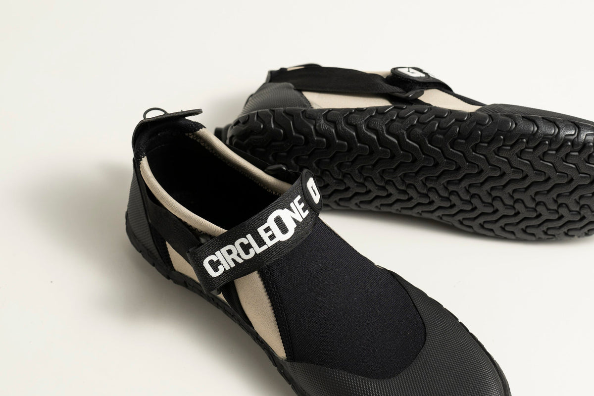3mm Adult Wetsuit reef boots in black neoprene with thick textured rubber soles and adjustable ankle straps.