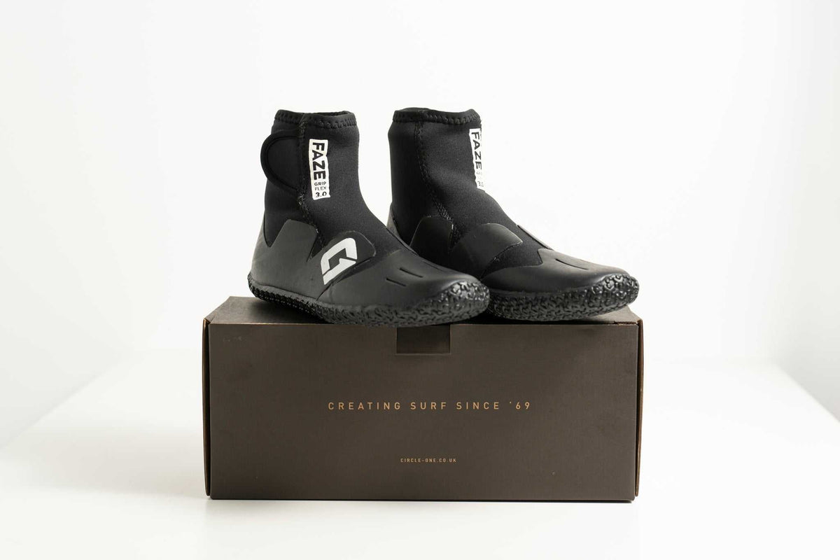 3mm Kids FAZE Wetsuit Boot in black neoprene with textured rubber soles, ankle support and adjustable Velcro closures.