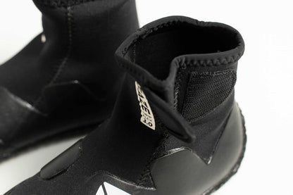 3mm Kids FAZE Wetsuit Boot in black neoprene, with a textured ankle cuff, reinforced panels and a grippy sole.