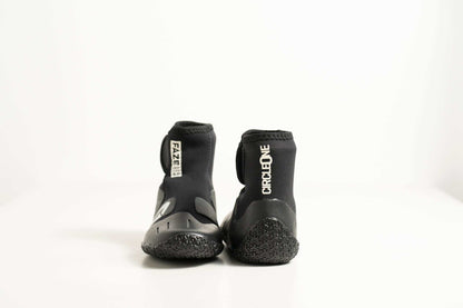 3mm Kids FAZE Wetsuit Boot in black neoprene, with textured rubber soles, ankle cuffs and adjustable closures.