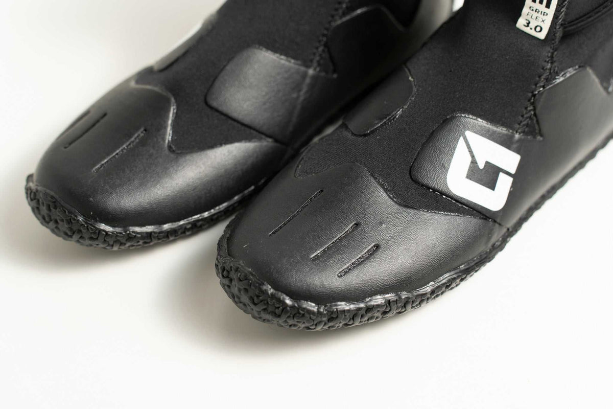3mm Kids FAZE Wetsuit Boot in black neoprene with textured rubber soles, reinforced toes and a white side logo.