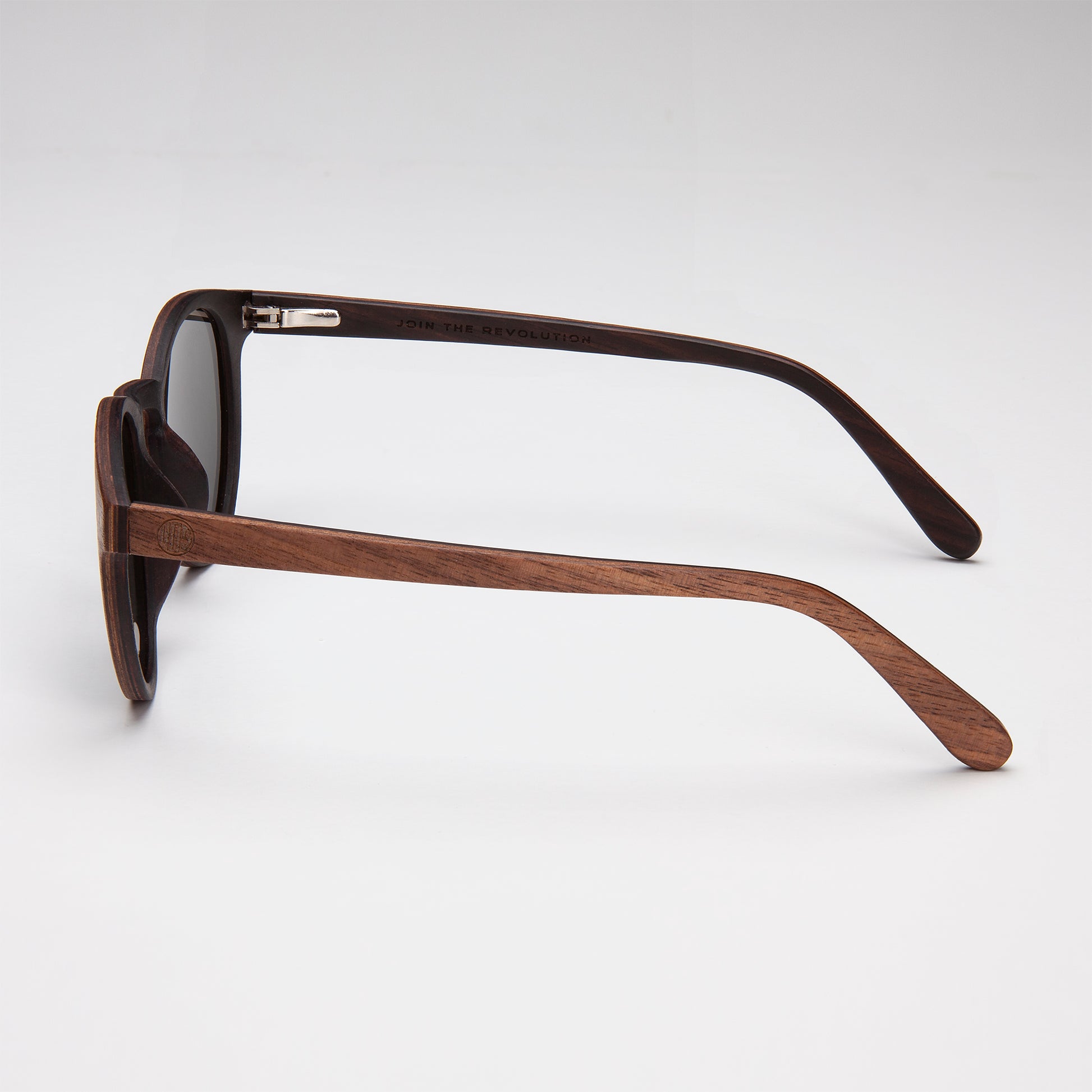 Eco Friendly SunglassesPearl Silver MirrorCatch the summer rays in style with Pearl sunglasses! Featuring polarized mirrored lenses and stylish walnut wood veneer, they are perfect for long days at the beach