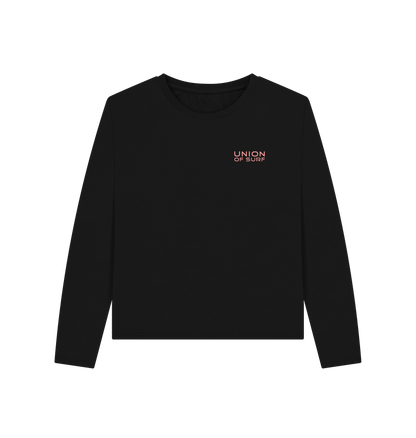 Woman wearing a Local Break Lover long sleeve graphic tee made from organic cotton