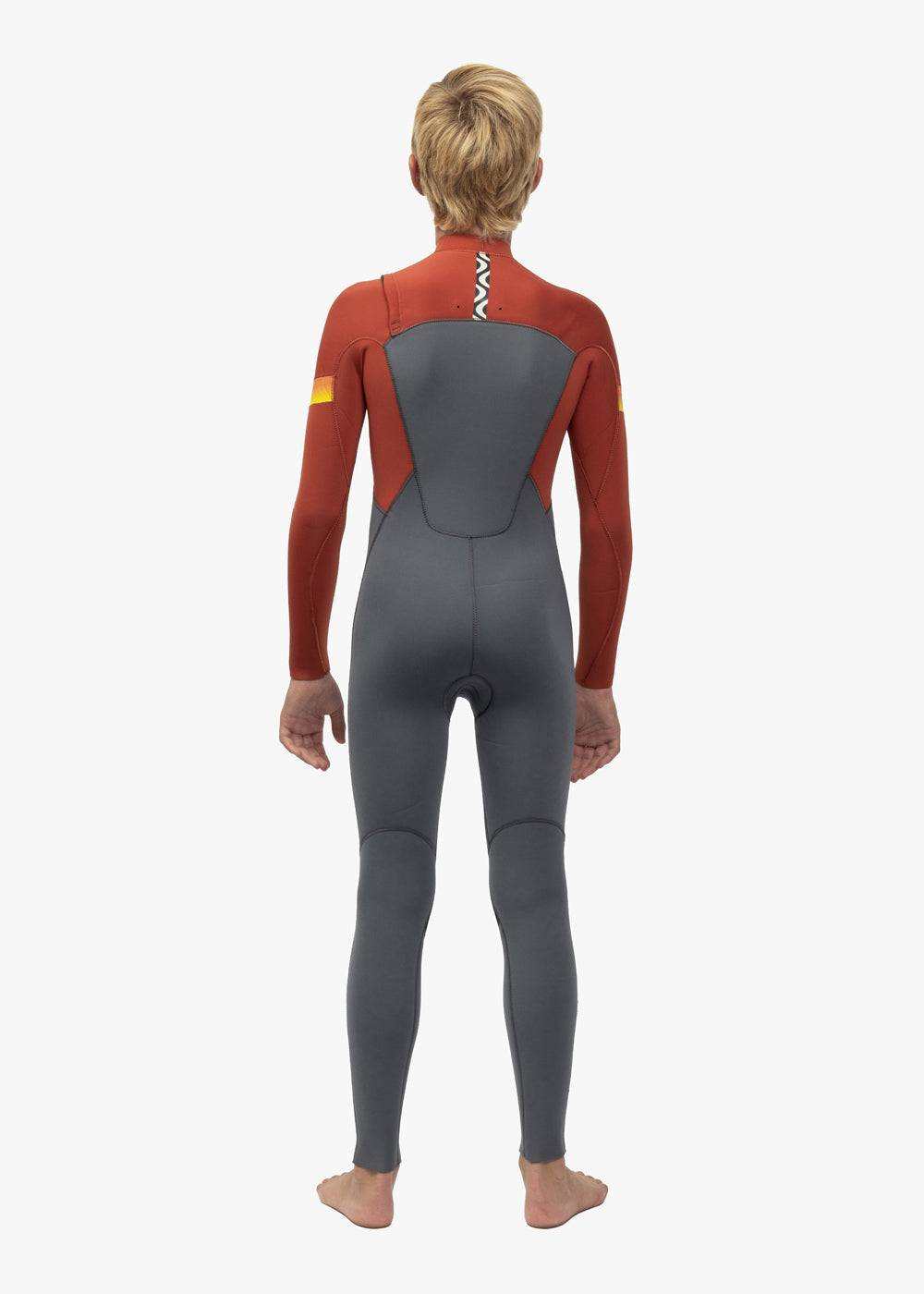 Vissla 7 Seas Boys full wetsuit in rust orange and grey neoprene with long sleeves and full legs, featuring a back zipper and contour panels.