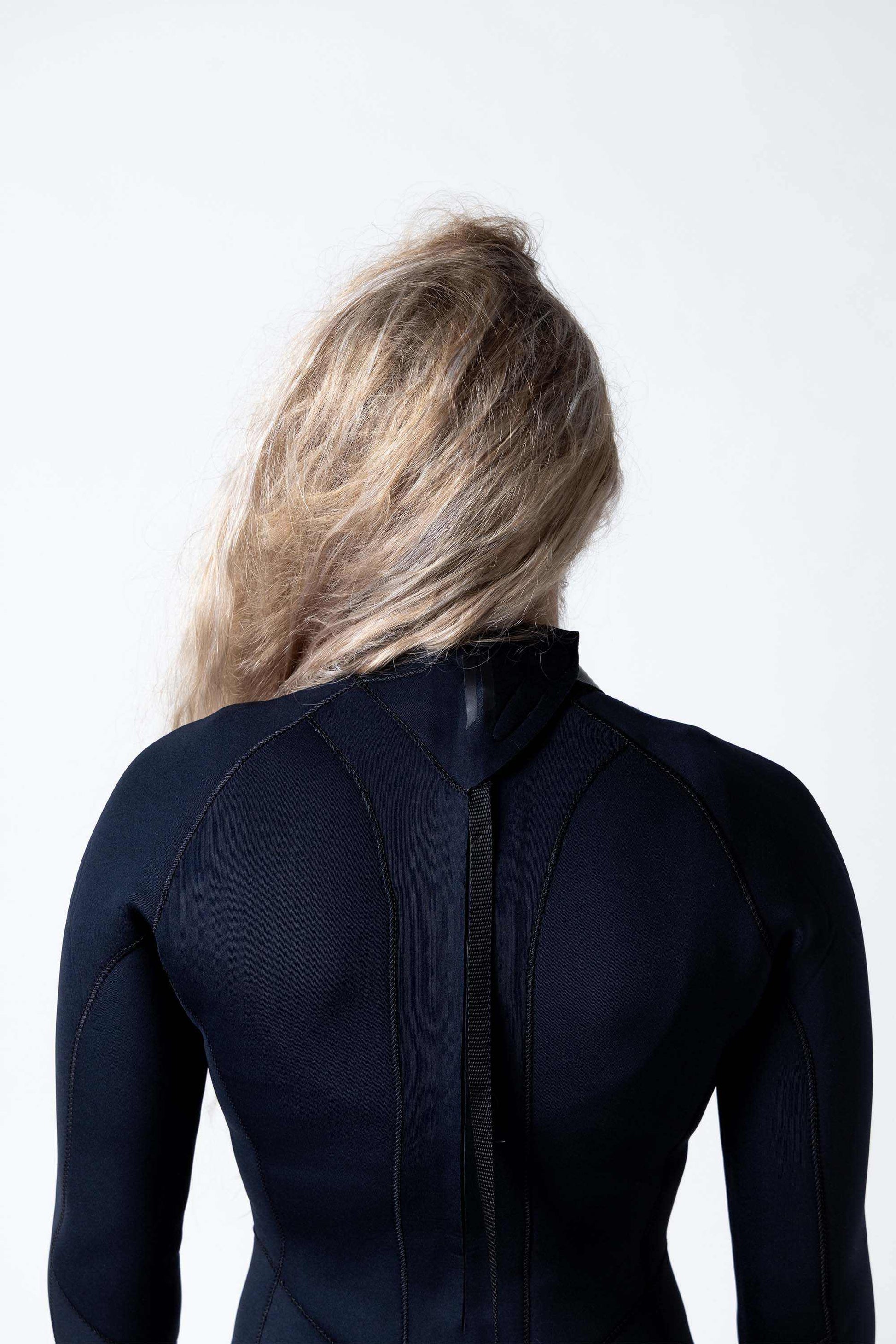 Premium womens 2mm back zip springsuit in black with contrast panelling and seamless neckline