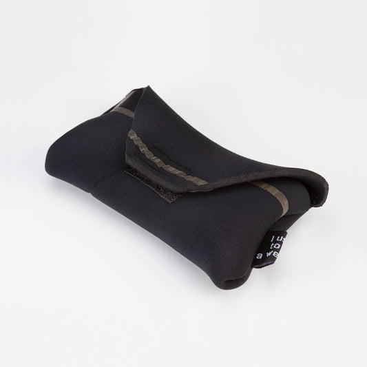 Black fabric roll with gray stripe on a white background