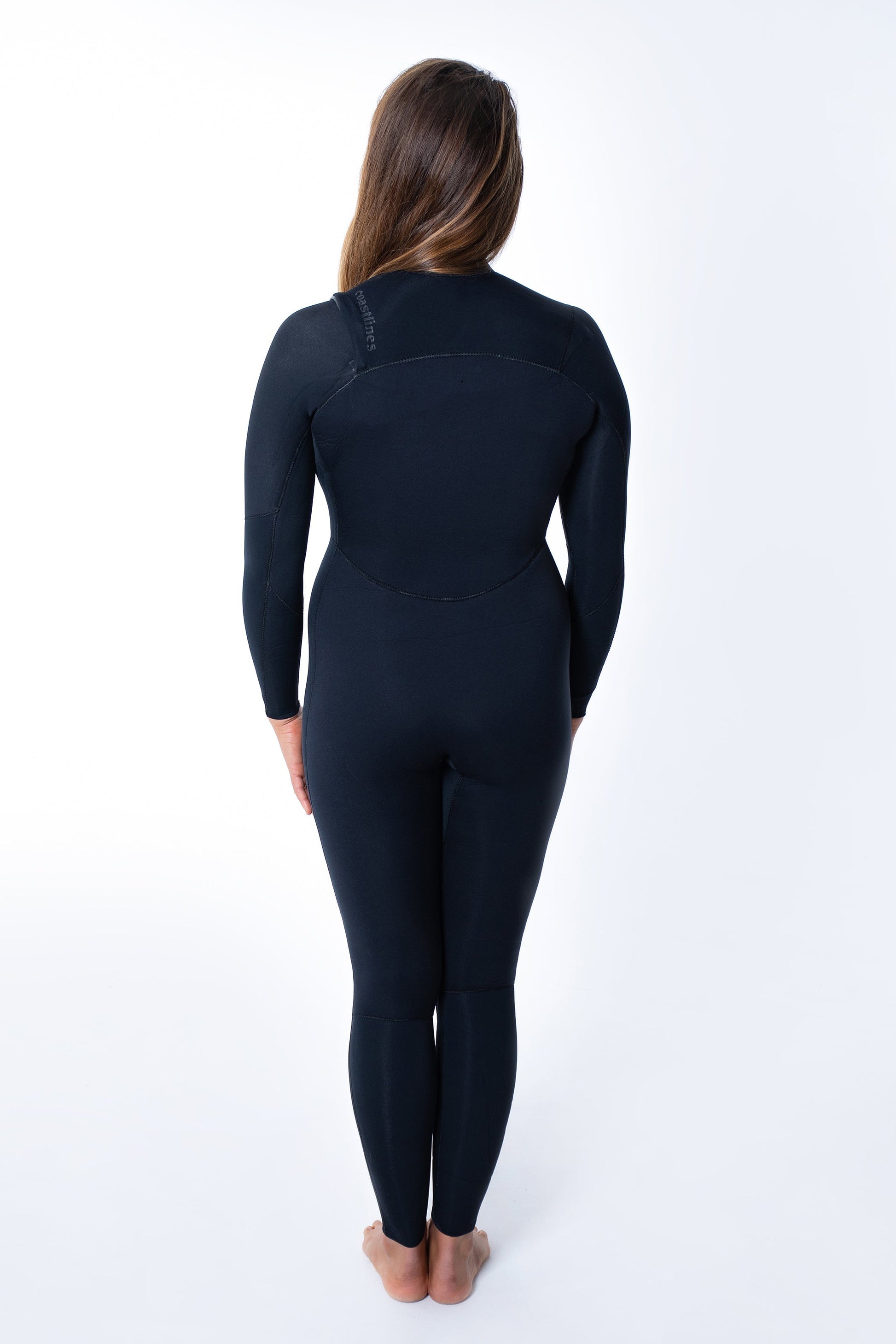 Merino Insulator Series womens 3/2 chest zip steamer wetsuit with woolly thermal lining and taped seams for warm summer surf sessions