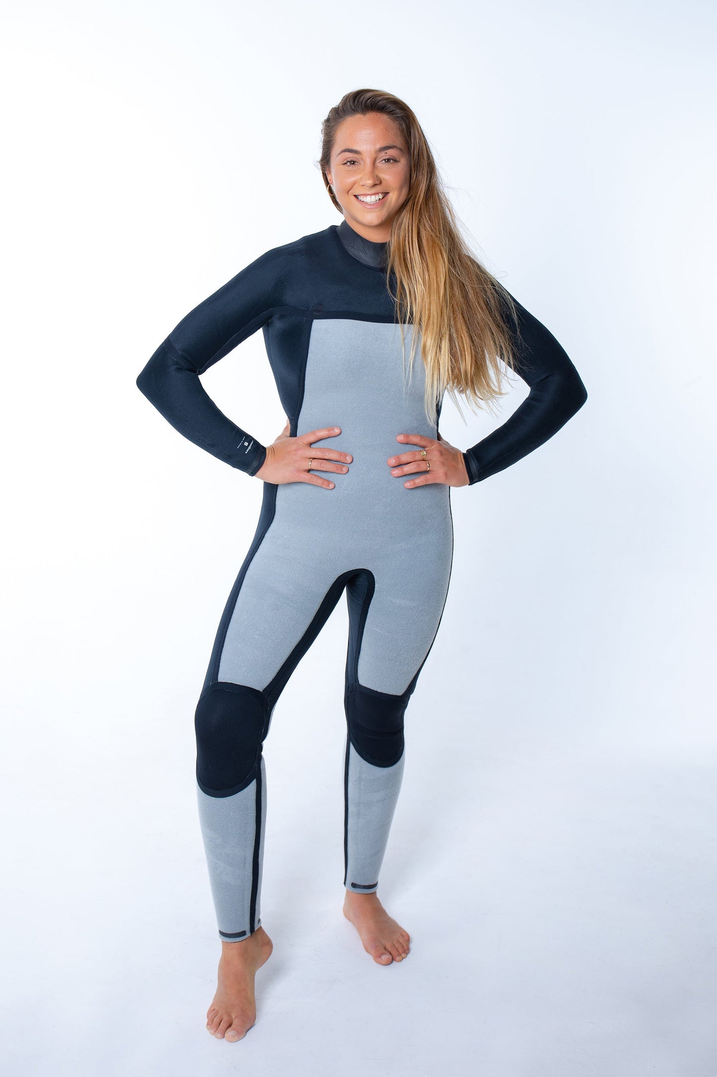 Womens Merino Insulator Series 4/3 chest zip steamer wetsuit with thermal wool lining and taped seams for cold water surfing