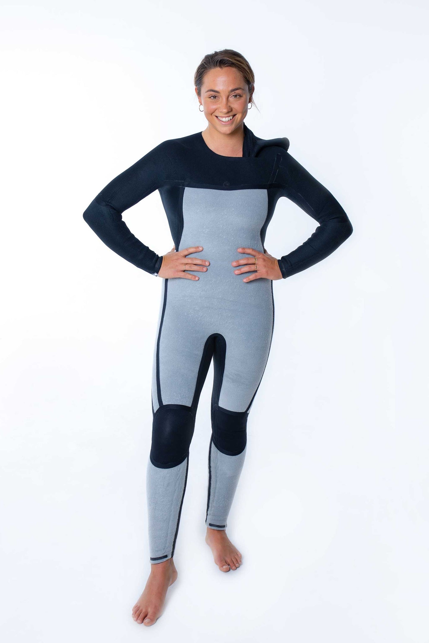 Women’s Merino Insulator Series 5/4 hooded chest zip steamer wetsuit with rapid dry thermal merino wool lining for cold water protection
