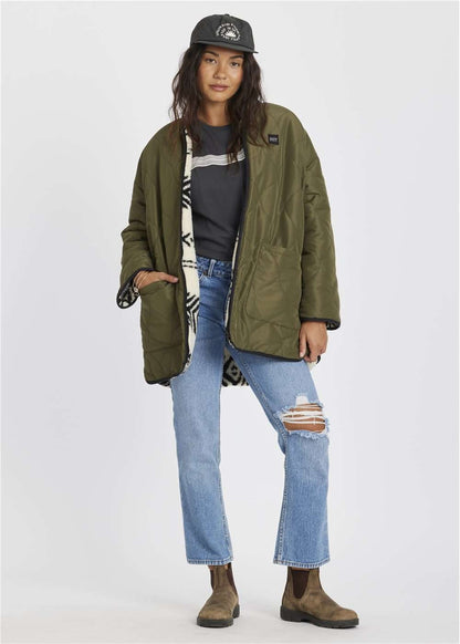 Sisstr Jane Jacket in olive green quilted nylon, with an oversized fit, front patch pockets and contrasting printed lining.