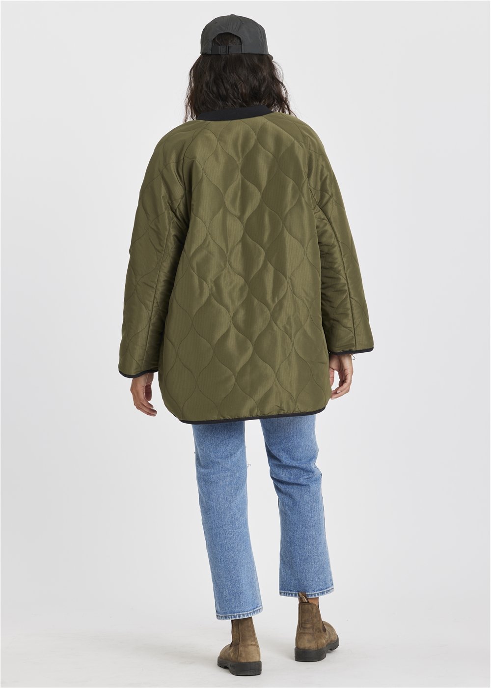 Sisstr Jane Jacket in olive green quilted nylon, with an oversized cut and diamond stitching across the back.