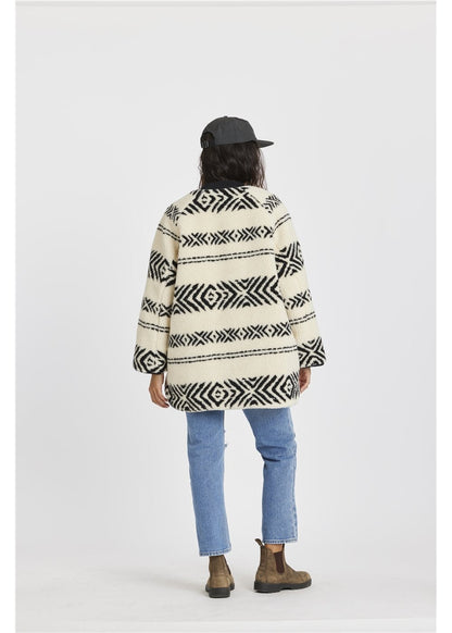 Sisstr Jane Jacket in cream and black patterned fleece, with bold geometric stripes, oversized fit and open-front design.