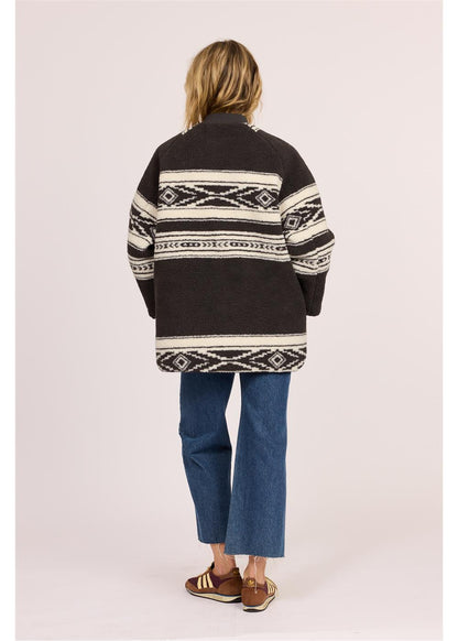 Sisstr Jane Jacket, oversized black sherpa with cream geometric patterned bands and a high collar.