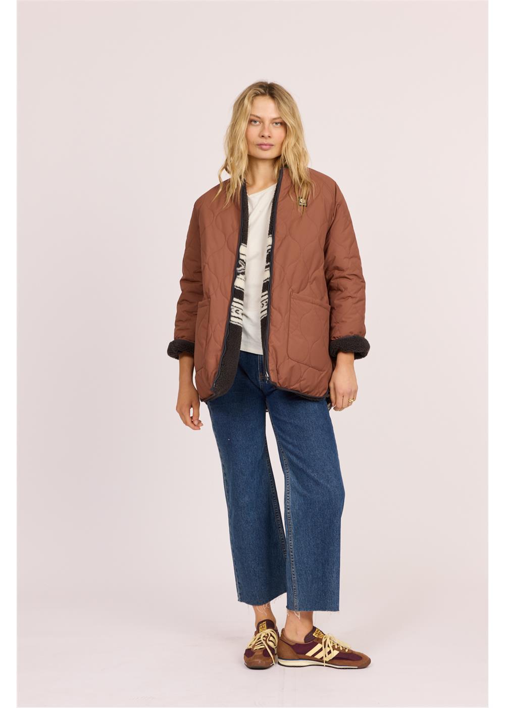 Sisstr Jane Jacket, brown quilted nylon with an oversized reversible design and contrasting dark sherpa cuffs

