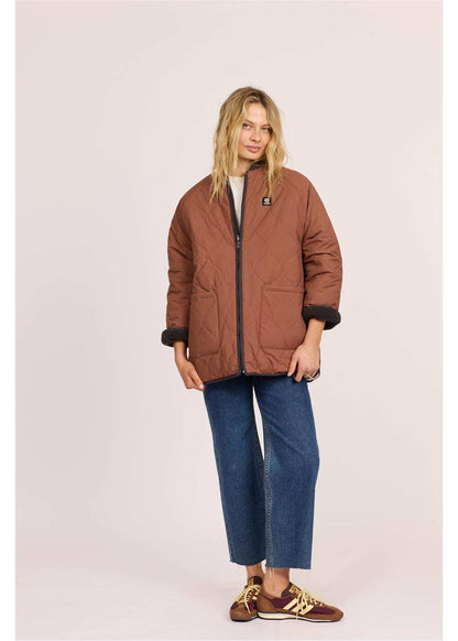 Sisstr Jane Jacket, brown quilted nylon with diamond stitching, black trim, and front patch pockets.