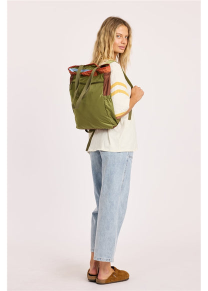 Sisstr Deckhand Tote Backpack in olive green nylon with a colorblock top, convertible tote handles and adjustable backpack straps.