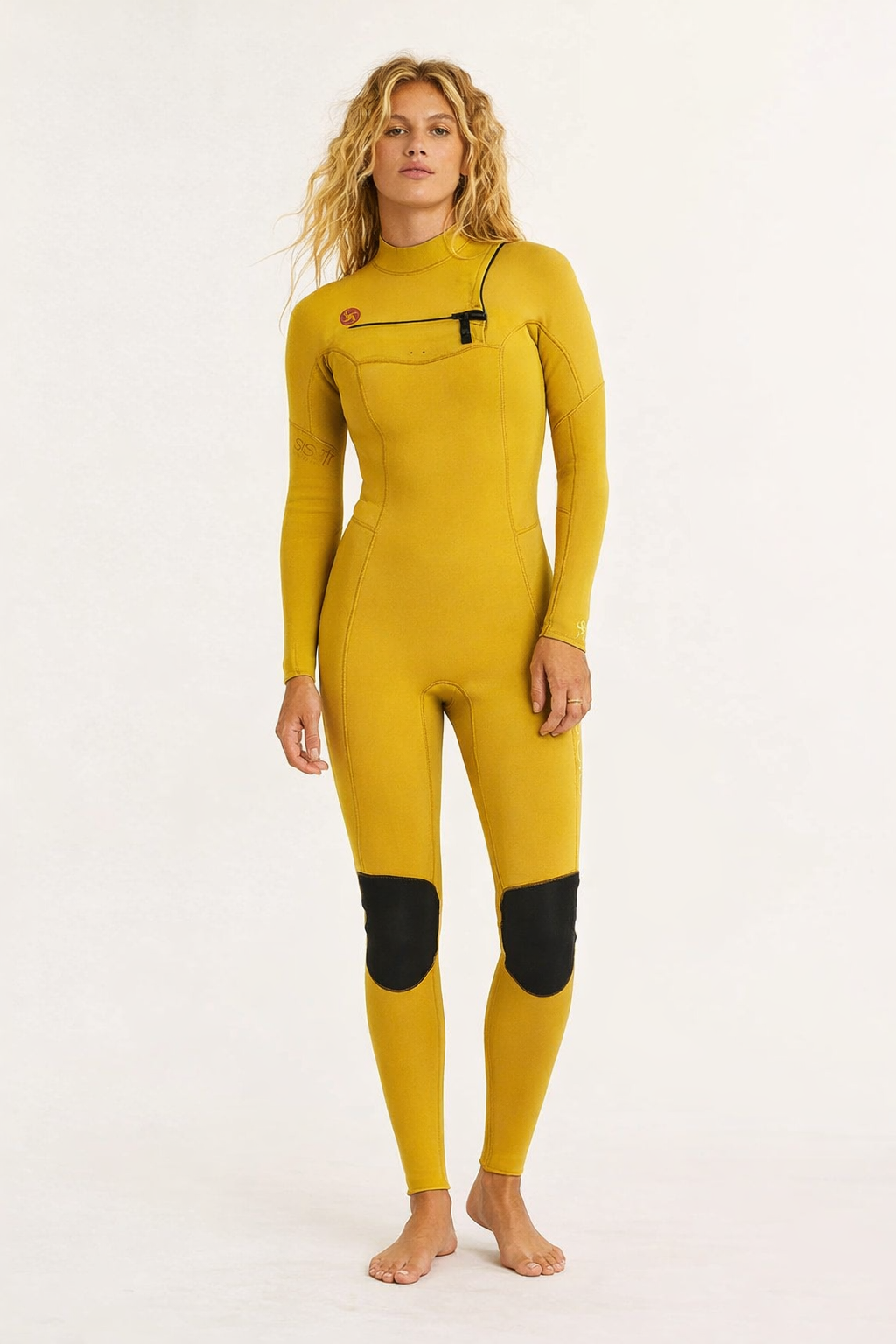 Sisstrevolution 7 seas women's wetsuit in mustard yellow with black knee pads, chest zip, and a sleek, form-fitting design.