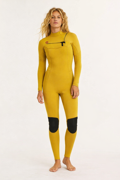 Sisstrevolution 7 seas women's wetsuit in mustard yellow with black knee pads, chest zip, and a sleek, form-fitting design.