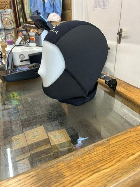 Cloudbreak 3mm wetsuit hood in black neoprene with sleek single-lined construction and ear drain holes for extra warmth and comfort.