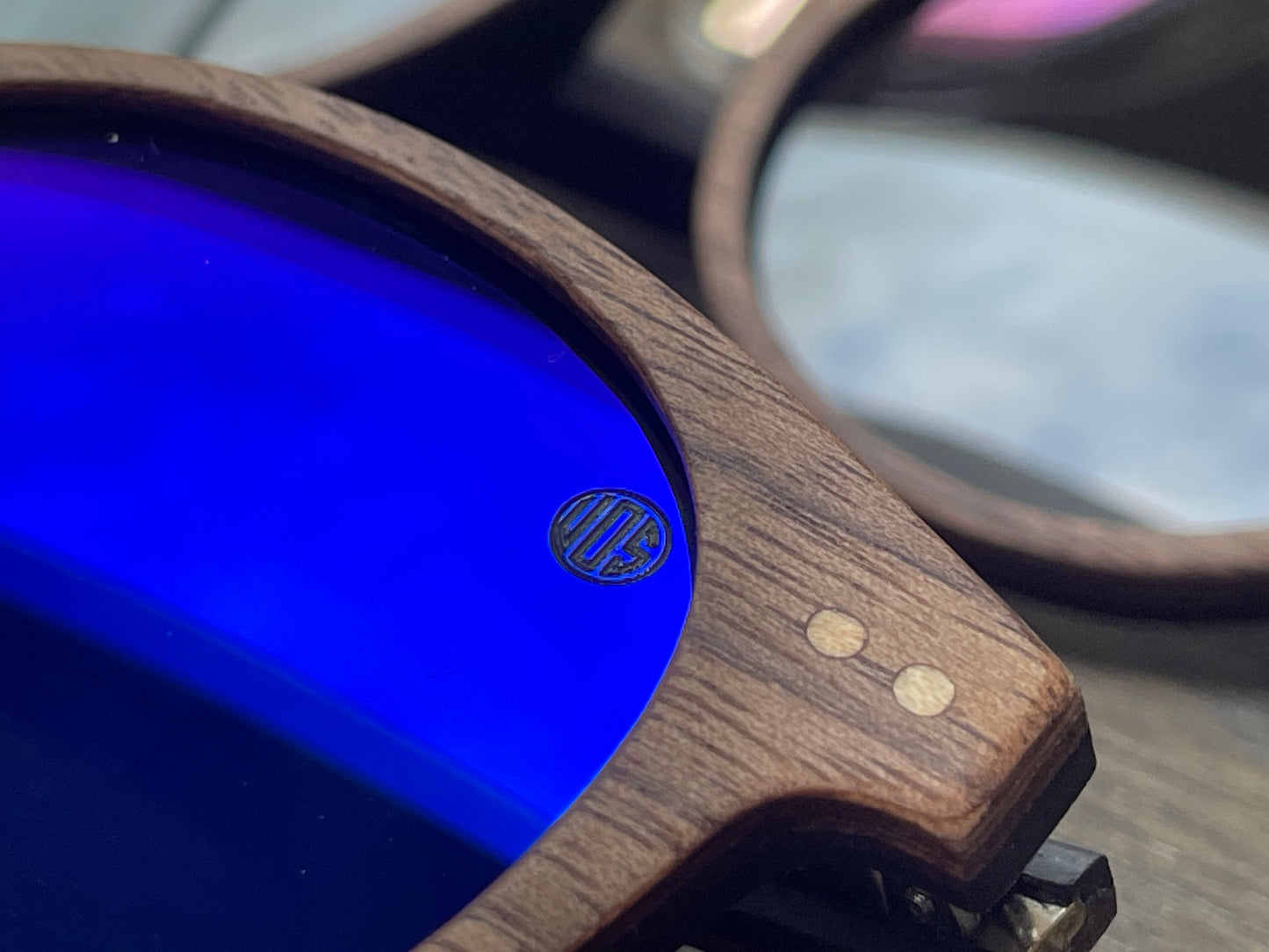 Eco Friendly SunglassesPearl- Blue MirrorCatch the summer rays in style with Pearl sunglasses! Featuring polarized mirrored lenses and stylish walnut wood veneer, they are perfect for long days at the beachPearl- Blue Mirror