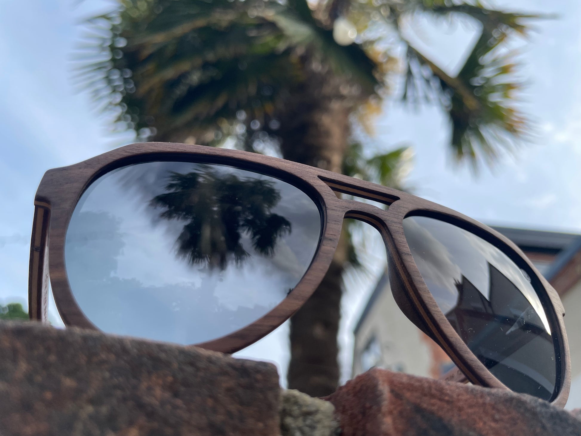Eco Friendly SunglassesSolSol, Surf, Sand. Feel the cool breeze of sophistication with our Sol Walnut Edition sunglasses! Our lifestyle inspired design and waveology polarized lens are perfec