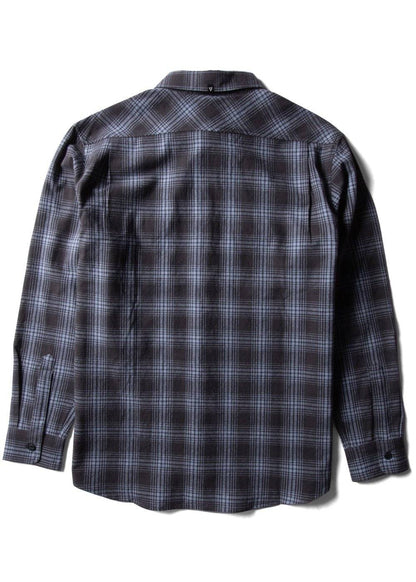 Vissla Central Coast Eco flannel shirt in charcoal and gray organic cotton plaid, with long sleeves and button cuffs.