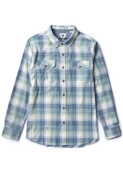 Vissla Central Coast Eco flannel shirt in pale blue, green and white plaid, with long sleeves and two buttoned chest pockets.